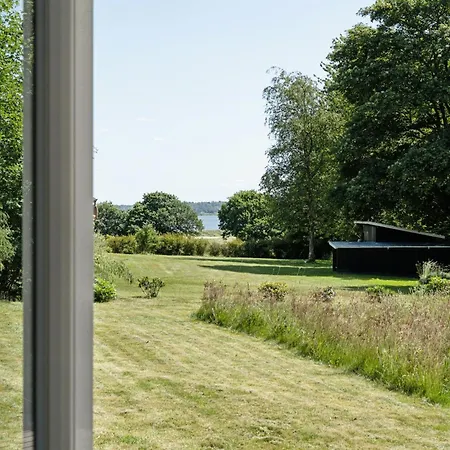Forest House With Stream By Hjarbaek Fjord 霍伊斯莱乌
